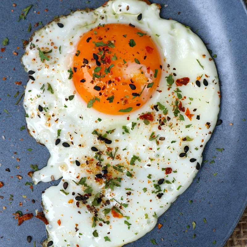 Fried egg with Egg Master sprinkle seasoning on top